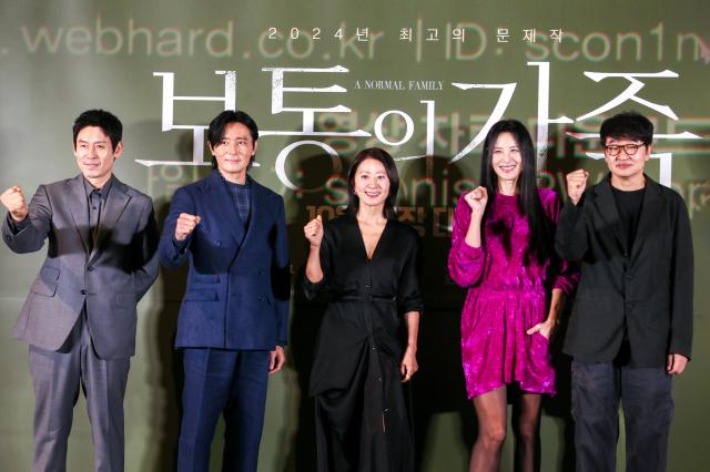 From left Actors Sol Kyung-gu Jang Dong-gun Kim Hee-ae and Su Hyun as well as director Hur Jin-ho attend a press conference for A Normal Family at CGV Yongsan IPark Mall in Seoul on Sept 24 2024 AJP Kim Dong-woo