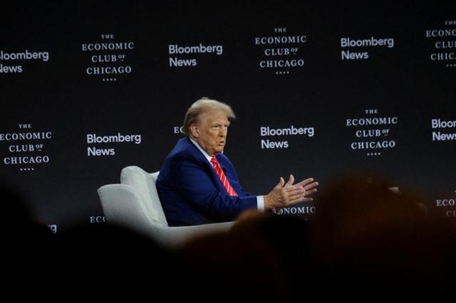 Republican presidential nominee and former US President Donald Trump speaks during an interview with Bloomberg Editor-in-Chief John Micklethwait at the Economic Club of Chicago in Illinois US on Oct 15 AP-Yonhap