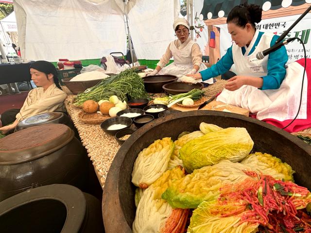 A demonstration of kimchi-making takes place at the Korea kimchi-making for the winter Festival in Namsangol Hanok Village Seoul Oct 6 2024 AJP Han Jun-gu