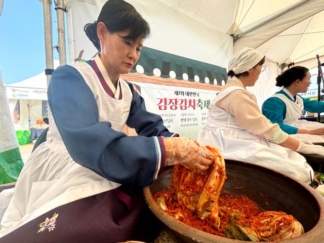 A demonstration of kimchi-making takes place at the Korea kimchi-making for the winter Festival in Namsangol Hanok Village Seoul Oct 6 2024 AJP Han Jun-gu