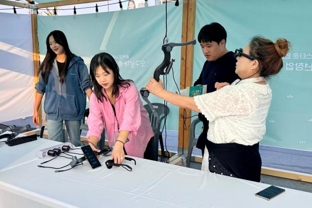 Visitors participate in booth activities at the Jongno Youth Startup Festival at Gwanghwamun Square in Seoul on Oct 16 2024 AJP Kim Dong-woo