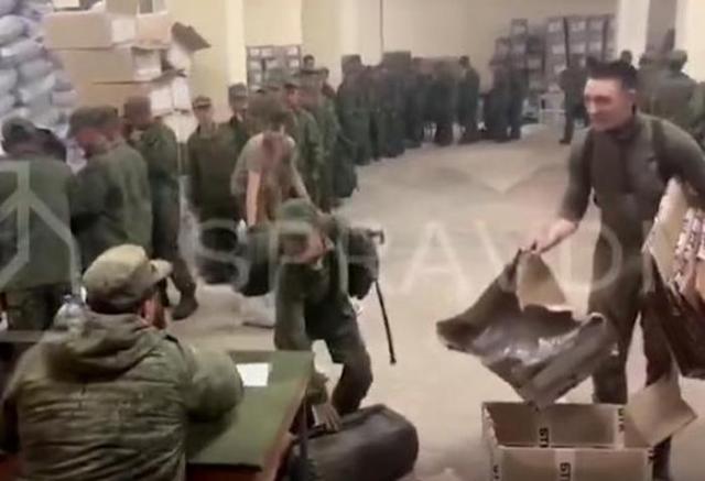 North Korean soldiers is being outfitted in Russian military uniforms in this grab from a video clip provided by Ukrainian government-affiliated organization SPRAVDI