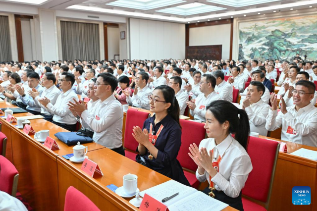 Participants applaud following a representatives speech at an awards ceremony recognizing exemplary teachers outstanding groups and institutions in Chinas education sector in Beijing China on Sept 8 2024 Xinhua-Yonhap