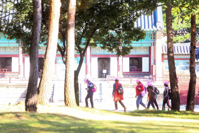 Participants walk along the course at the Walking Festival for the Blue House and Five Royal Palaces in Seoul on Oct 19 2024 AJP Kim Dong-woo