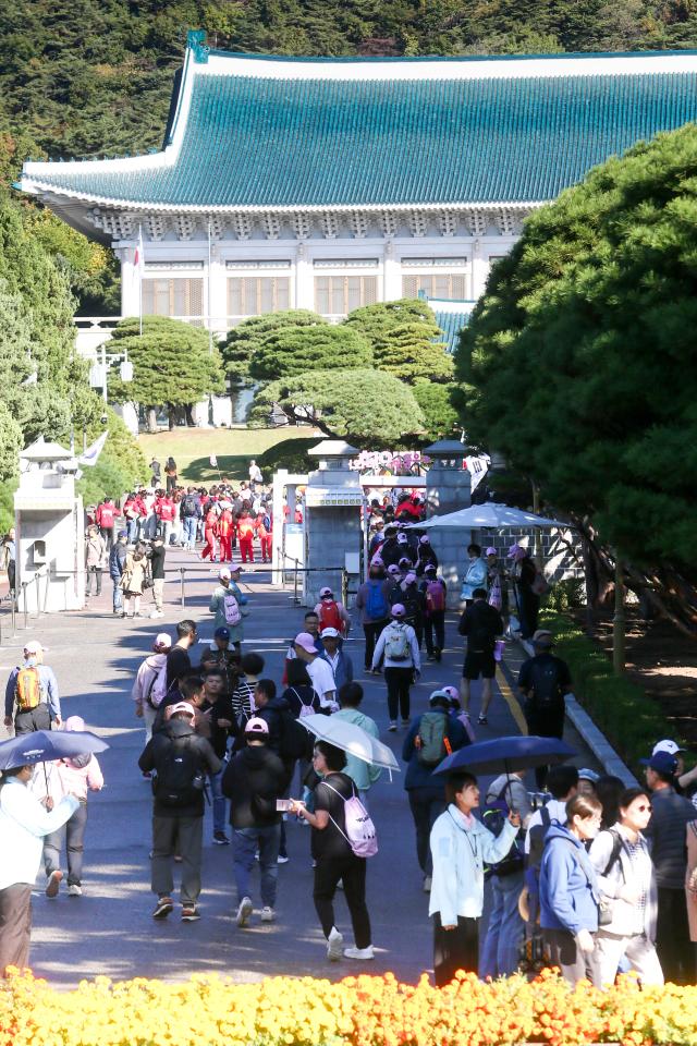 Participants walk along the course at the Walking Festival for the Blue House and Five Royal Palaces in Seoul on Oct 19 2024 AJP Kim Dong-woo