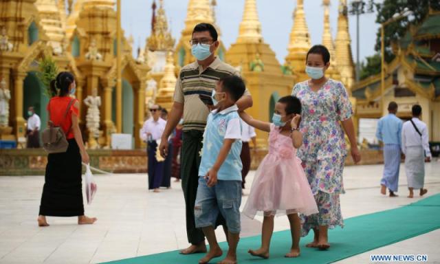 People are seen visiting the Shwedagon Pagoda in Yangon Myanmar on June 6 2021 Xinhua-Yonhap