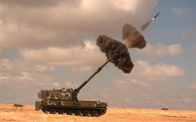 This undated photo shows a K9 Thunder a self-propelled howitzer firing a shell Courtesy of the Defense Acquisition Program Administration