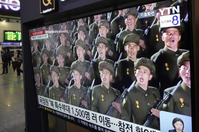 A TV screen shows images of North Korean soldiers during a news program at a railway station in Seoul on Oct 18 2024 AP-Yonhap