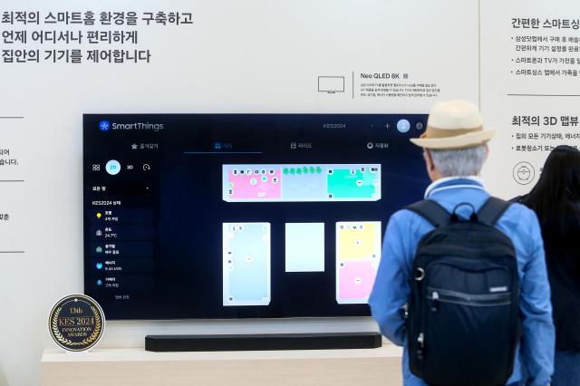 A visitor looks at an exhibition booth at the KES 2024 at COEX in Seoul on Oct 22 2024 AJP Kim Dong-woo