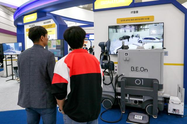 Visitors look at exhibition booths at KES 2024 at COEX in Seoul on Oct 22 2024 AJP Kim Dong-woo