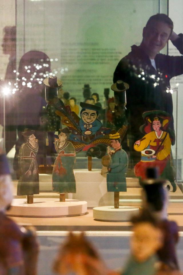 Visitors view exhibits at the Parade special exhibition at the National Folk Museum of Korea in Seoul on Oct 22 2024 AJP Kim Dong-woo