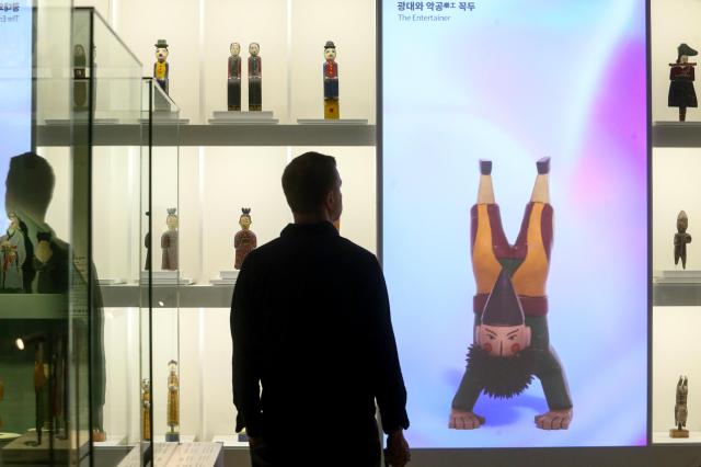 A visitor views exhibits at the Parade special exhibition at the National Folk Museum of Korea in Seoul on Oct 22 2024 AJP Kim Dong-woo