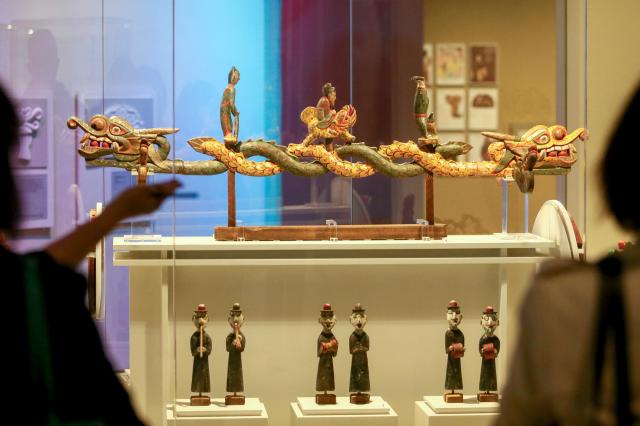 Visitors view exhibits at the Parade special exhibition at the National Folk Museum of Korea in Seoul on Oct 22 2024 AJP Kim Dong-woo