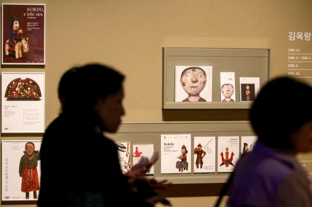 Visitors view exhibits at the Parade special exhibition at the National Folk Museum of Korea in Seoul on Oct 22 2024 AJP Kim Dong-woo