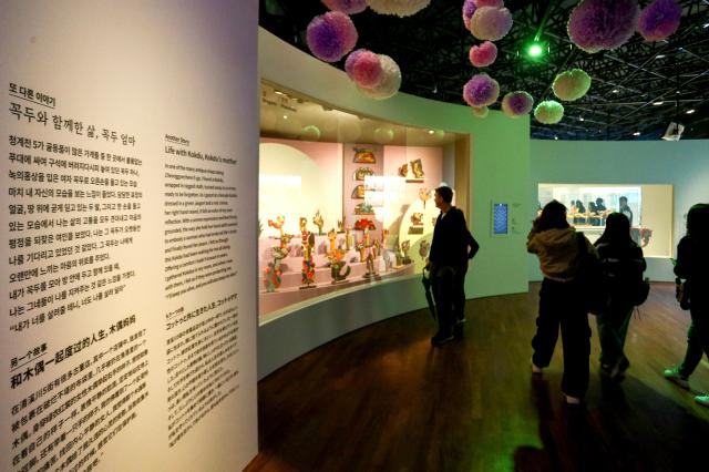 Visitors view exhibits at the Parade special exhibition at the National Folk Museum of Korea in Seoul on Oct 22 2024 AJP Kim Dong-woo