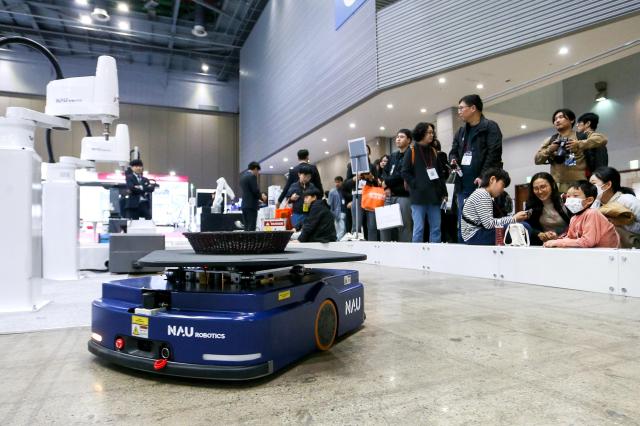 Visitors view exhibits at Robot World 2024 at KINTEX in Seoul on Oct 23 2024 AJP Kim Dong-woo