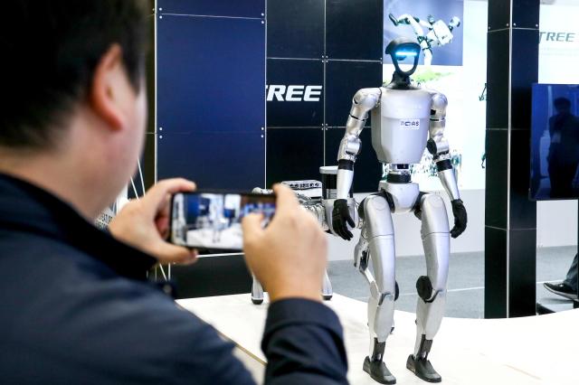 A visitor takes a photo at Robot World 2024 at KINTEX in Seoul on Oct 23 2024 AJP Kim Dong-woo