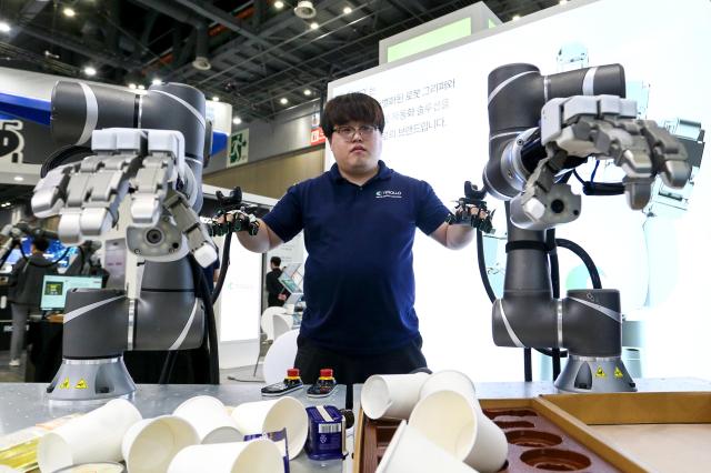 An exhibitor demonstrates products at Robot World 2024 at KINTEX in Seoul on Oct 23 2024 AJP Kim Dong-woo