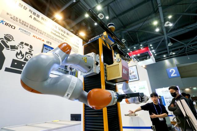 Visitors view exhibits at Robot World 2024 at KINTEX in Seoul on Oct 23 2024 AJP Kim Dong-woo