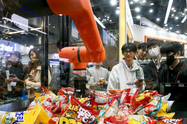 Visitors view exhibits at Robot World 2024 at KINTEX in Seoul on Oct 23 2024 AJP Kim Dong-woo