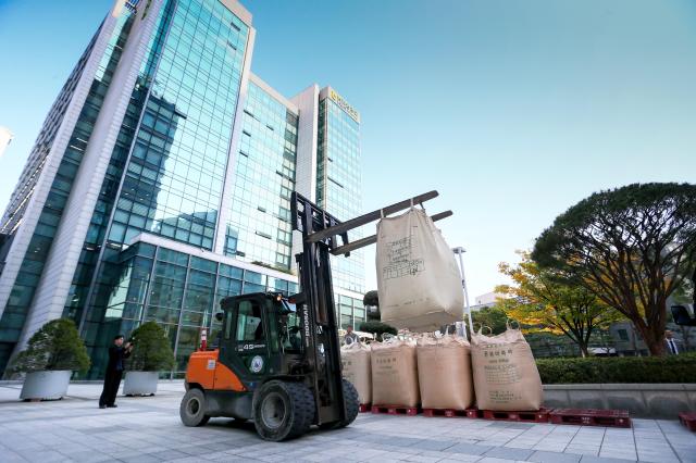 Farmers stack rice during a rally organized by the National Farmers Federation in Seoul on Oct 24 2024 AJP Kim Dong-woo