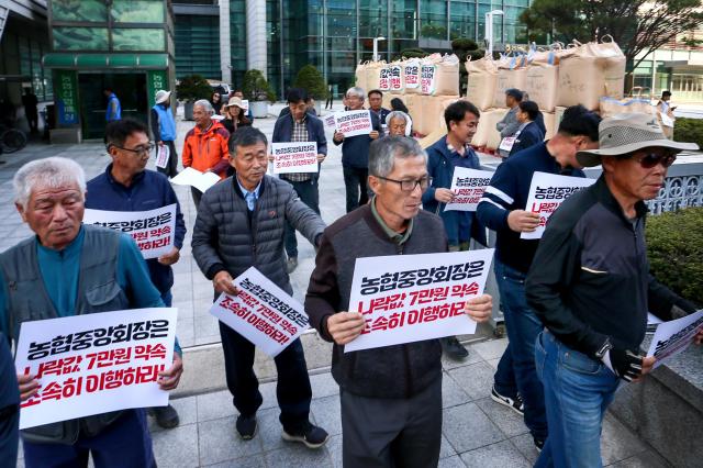 Farmers carry picket signs during a rally organized by the National Farmers Federation in Seoul on Oct 24 2024 AJP Kim Dong-woo