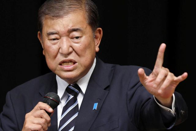 Japanese Prime Minister Shigeru Ishiba makes a speech at a campaign for the upcoming general election in Toyonaka Osaka Prefecture Japan Oct 24 2024 Kyodo via Reuters-Yonhap