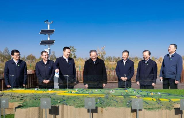 Chinese Premier Li Qiang conducts an on-site investigation into the integrated management of soil and water conservation in Ordos located in the Inner Mongolia Autonomous Region on Oct 23 2024  Xinhua-Yonhap