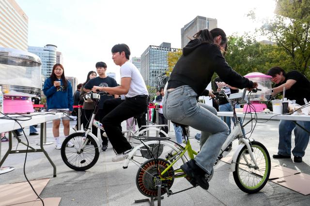 Visitors participate in booth events during the Seoul Extreme Sports Festival at Gwanghwamun Square in Seoul on Oct 25 2024 AJP Kim Dong-woo