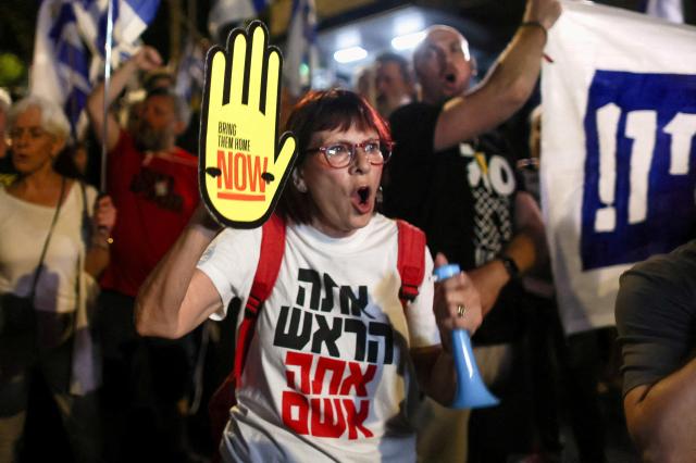 Protesters attend a demonstration against Israeli Prime Minister Benjamin Netanyahus government in Jerusalem on Jun 20 2024 Reuters-Yonhap