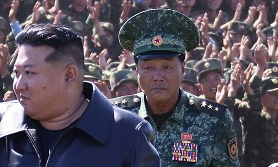 Kim Young-bok Deputy Chief of the General Staff of the Korean Peoples Army accompanies North Korean leader Kim Jong-un during his inspection of a special operations training base in the western part of North Korea on Oct2 2024 Korean Central News Agency via Yonhap News