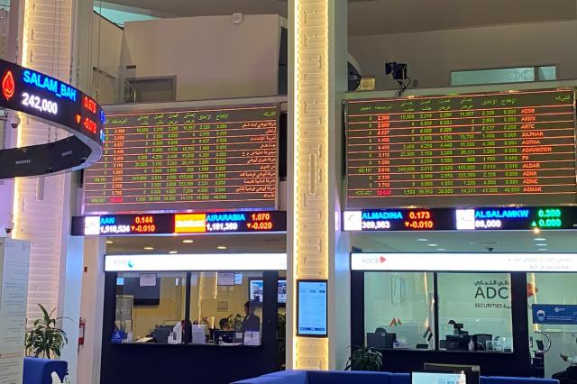 Electronic displays with stock data are seen at the stock market in Dubai United Arab Emirates in this file photo taken on Nov 5 2020 Reuters-Yonhap