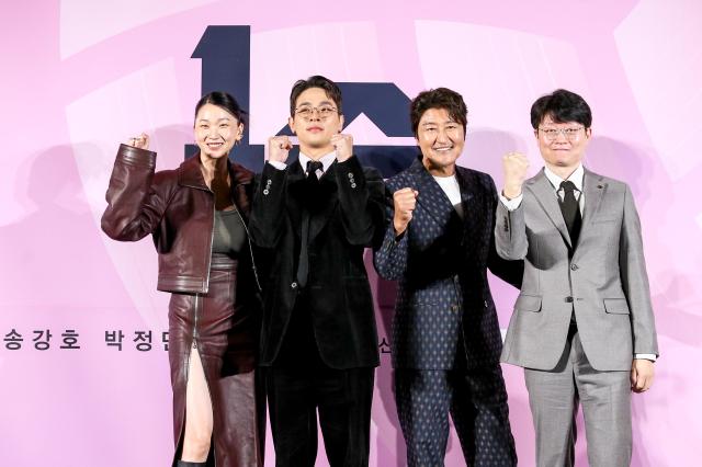 From left Actors Jang Yoon-ju Park Jeong-min Song Kang-ho and director Shin Yeon-shick pose during a press conference for One Win at CGV Yongsan IPark Mall in Seoul on Oct 28 2024 AJP Kim Dong-woo