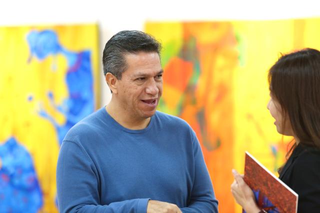 Mexican artist Lino Chávez converses with a visitor at the Latin American Cultural Center in Goyang Gyeonggi Province on Oct 24 2024 AJP Han Jun-gu