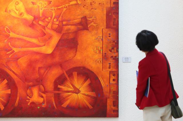 A visitor looks at works at an exhibition at the Latin American Cultural Center in Goyang Gyeonggi Province on Oct 24 2024 AJP Han Jun-gu