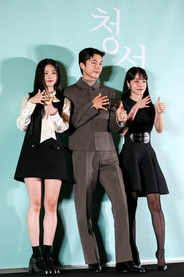 Please take care of us sign actors Roh Yoon-seo right Hong Kyung center and Kim Min-ju in sign language during a press conference for Hear Me Our Summer at Megabox COEX in Seoul on Oct 28 2024 AJP Kim Dong-woo