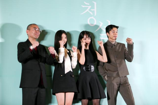 From left Director Cho Sun Ho and actors  Kim Min-ju Roh Yoon-seo and Hong Kyung  pose during a press conference for Hear Me Our Summer at Megabox COEX in Seoul on Oct 28 2024 AJP Kim Dong-woo