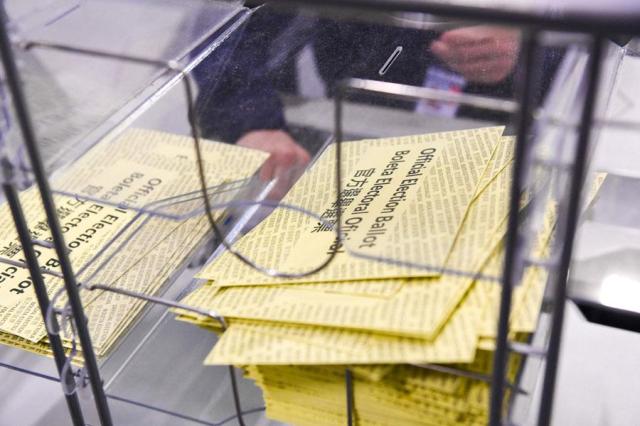 Poll workers demonstrate how ballots are are received processed scanned and securely stored on Election Day during a press tour in Philadelphia Pennsylvania on Oct 25 2024 AFP-Yonhap