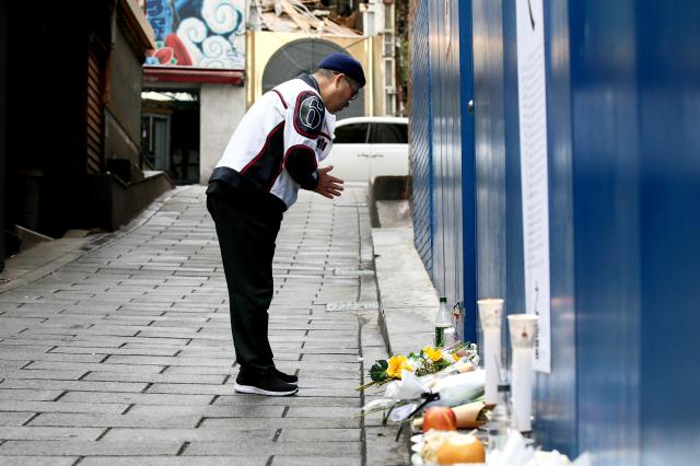 A visitor pays respects at October 29 Memorial Alley in Seoul on Oct 29 2024 AJP Kim Dong-woo