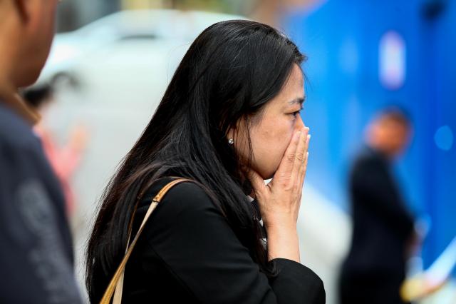 A visitor bows their head in grief at October 29 Memorial Alley in Seoul on Oct 29 2024 AJP Kim Dong-woo