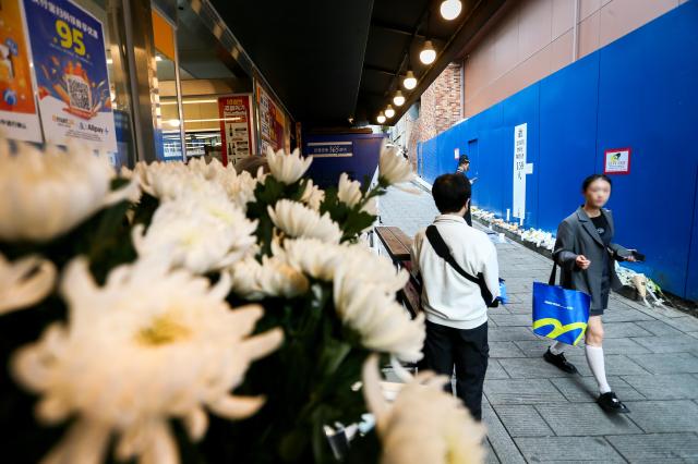 People walk through October 29 Memorial Alley in Seoul on Oct 29 2024 AJP Kim Dong-woo