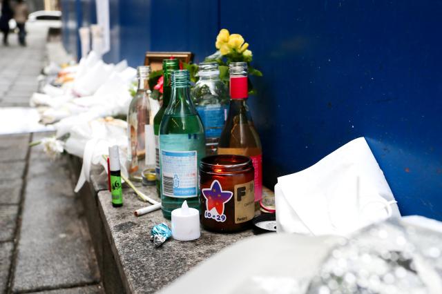 Flowers and candles left by mourners are seen at October 29 Memorial Alley in Seoul on Oct 29 2024 AJP Kim Dong-woo