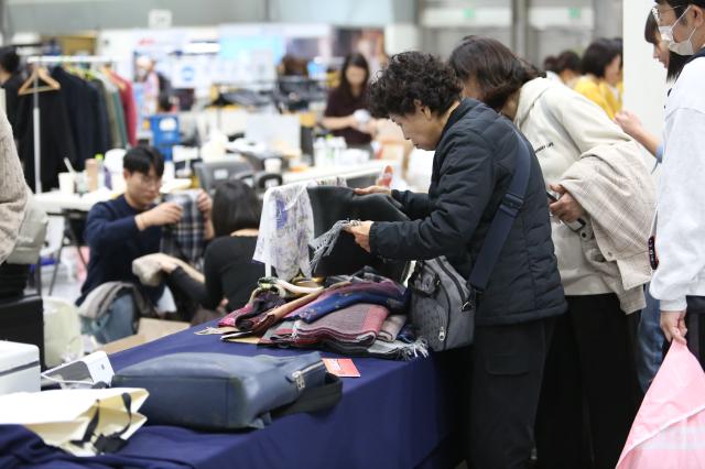 Visitors look at products during the 2024 Red Cross Bazaar at COEX in Seoul Oct 29 2024 AJP Han Jun-gu