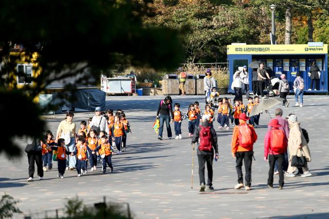 Visitors walk along a trail at Seoul Grand Park in Gwacheon Gyeonggi Province on Oct 30 2024 AJP Kim Dong-woo