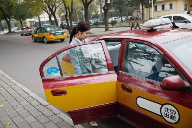 This photo shows a taxi Getty Images Bank