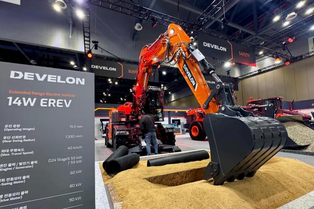 A visitor looks at exhibits at the Asia Machinery  Manufacturing Exhibition AMXPO at KINTEX in Goyang Gyeonggi Province on Oct 31 2024 AJP Kim Dong-woo