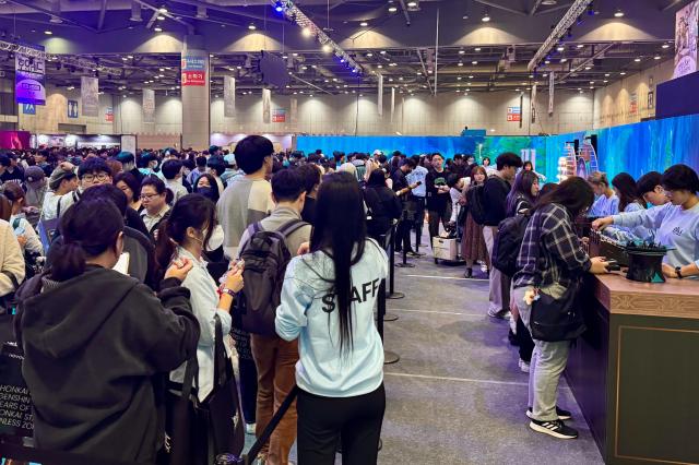 Visitors line up for booth events at Welcome to Hoyoland at KINTEX in Goyang Gyeonggi Province on Oct 31 2024 AJP Kim Dong-woo