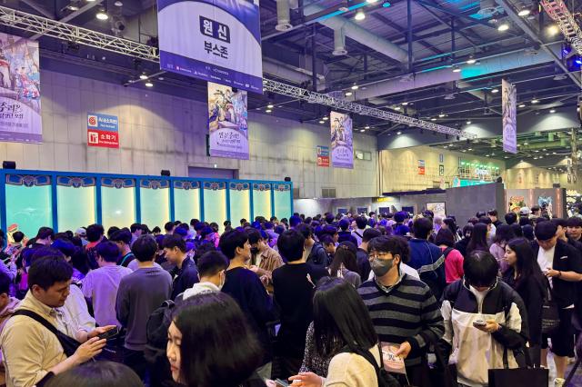 Visitors line up for booth events at Welcome to Hoyoland at KINTEX in Goyang Gyeonggi Province on Oct 31 2024 AJP Kim Dong-woo