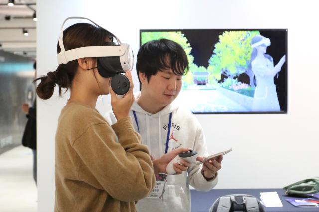 Visitors try out AI experiences at the AI Content Festival 2024 at COEX Seoul on Oct 31 2024 AJP Han Jun-gu