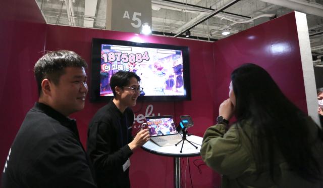 Visitors try out AI experiences at the AI Content Festival 2024 at COEX Seoul on Oct 31 2024 AJP Han Jun-gu